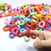 Generic 100-pcs set of soft, durable hair ties in packaging for easy storage and travel
