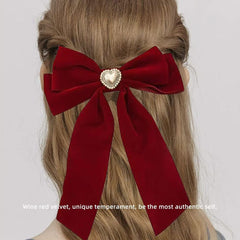 Generic velvet bows in green and red, versatile for many hairstyles