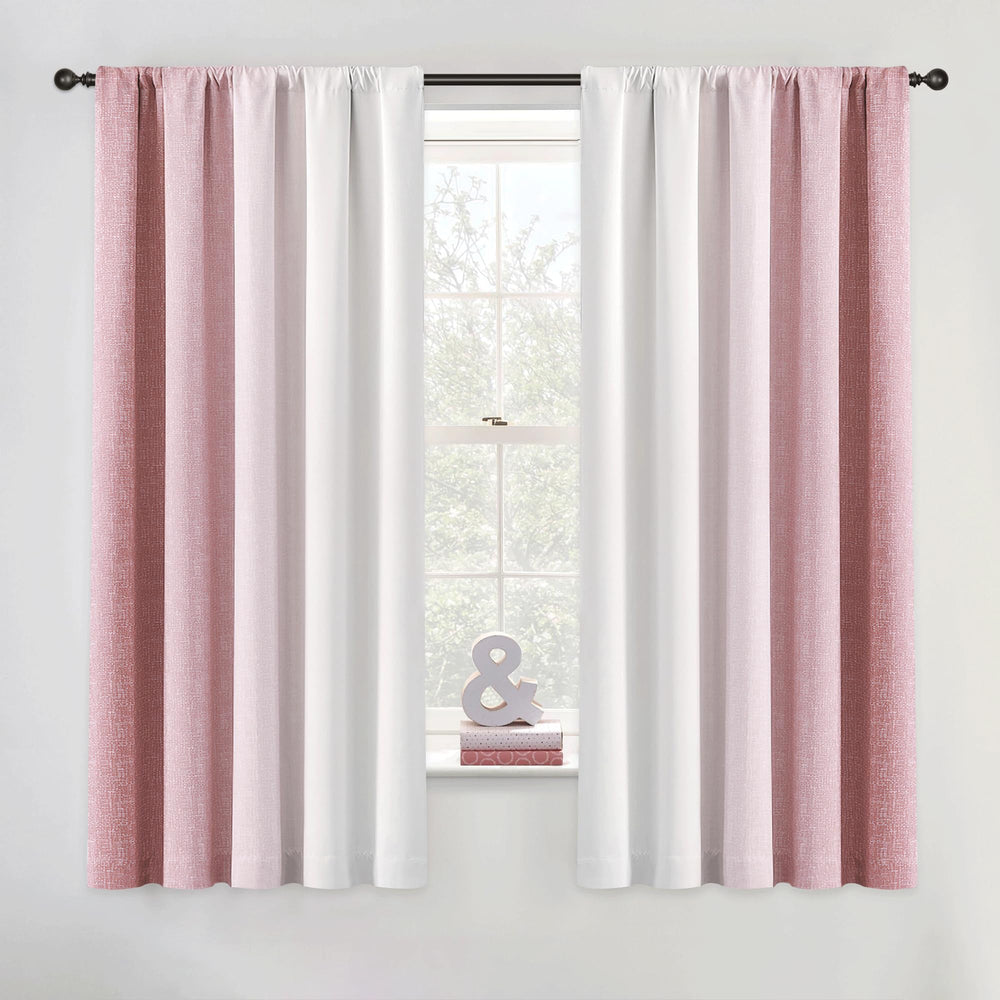 Geomoroccan ombre curtains in pink to white gradient for bedroom ambiance.