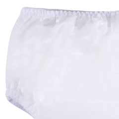 Gerber waterproof pants protecting outfits over diapers during play and splash