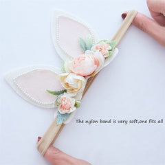 GEZISAN flower headband nylon, adjustable fit from newborn to toddler.