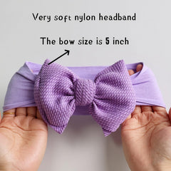 GEZISAN handmade dacron-spandex bow attached to a stretchy nylon band.