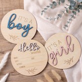 Giftacity gender reveal sign for boy with blue 3D letters, ideal for photos.