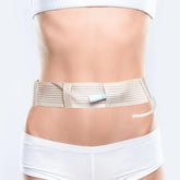 Giiiiump PD Belt worn by model for discreet catheter placement and daily comfort.