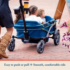 Gladly Family Anthem4 quad wagon canopy in use providing shade for riders