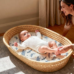 Gllquen Baby bassinet sheets close-up shows soft muslin texture and air permeability
