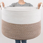 Goodpick large storage basket 83L in living room for tidy blankets and toys.