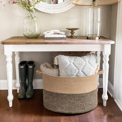 Goodpick wicker storage basket with two handles for portable, room-to-room use.