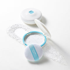 GOONGBE Pri-mmune powder brushed onto a baby's arm to soothe skin.