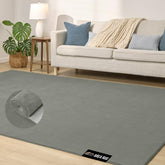 GORILLA GRIP slip-resistant backing on a gray area rug securing it in a living room