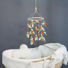 Goukurlsma Leaf Crib Mobile shows wooden bead accents for a natural nursery accent.