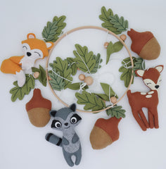 Goukurlsma woodland crib mobile acorn detail adds whimsical nursery decor.