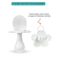 Grabease with choke-barrier for safer infant feeding experiences.