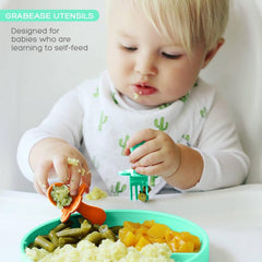 Ergonomic Grabease utensils with easy-grip handles for tiny hands.