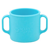 Green Sprouts Learning Cup with easy-grip handles for independent sipping.