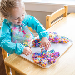Green Sprouts soft-material long-sleeve bib for daily wear