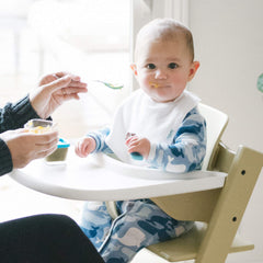 Green Sprouts Stay-Dry Bib 3-12 months size demonstrates snug protection during meals