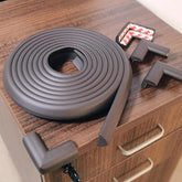 Grelex baby proof edges foam strip on a table edge for safer play