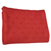 Grewear baby knit blanket eyelet pattern close up highlighting breathable cotton texture