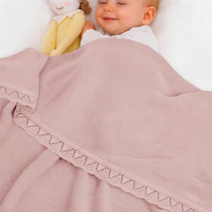 Grewear baby knit blanket shows soft cotton texture for cozy, skin-friendly snuggles.