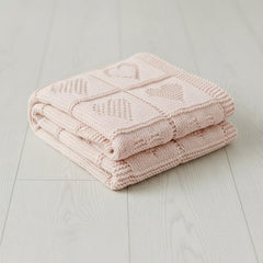 Grewear baby knit cotton blanket with pink heart texture for cozy nursery cuddles.