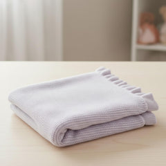 Grewear breathable knit baby blanket keeps your child cozy without overheating.