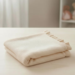 Grewear cotton baby blanket in stroller demonstrates versatile on-the-go use