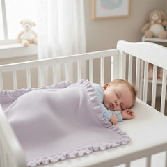 Grewear soft cotton blanket with ruffle edge, perfect for crib time and soothing skin.