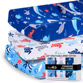 Grow Wild changing pad cover in ocean pattern offers soft, breathable comfort during diaper changes.