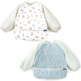 GRSSDER long-sleeve bib with floral pattern keeps outfits clean during meals.