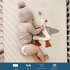 GRSSDER neutral cream crib sheet adds calm, versatile look to nursery.