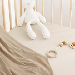GRSSDER ultra-soft jersey crib sheet offers breathable comfort for naps and bedtime.