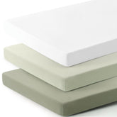 GRSSDER mini crib sheet in sage green fitted to a playard mattress for a secure, breathable fit