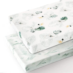 GRSSDER stretch jersey knit sheets securely fit portable cribs via elastic edges.