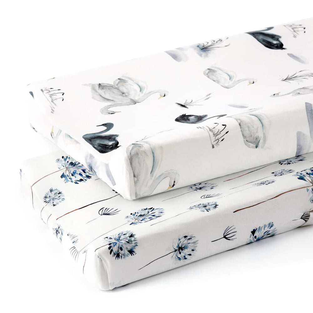 GRSSDER changing pad cover in Swan pattern offers snug, breathable comfort.