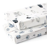 GRSSDER changing pad cover in Swan pattern offers snug, breathable comfort.