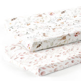 GRSSDER blush floral changing pad cover offers ultra-soft fabric for baby comfort.