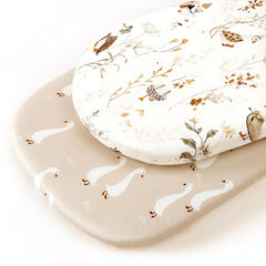 GRSSDER universal-fit sheets for oval, round, and rectangular bassinet mattresses.