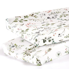 GRSSDER watercolor rose cover on a 32x16 changing pad, snug and stylish.