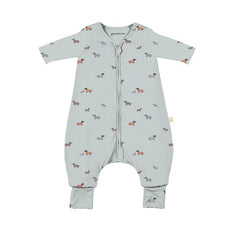 GUNAMUNA sleep sack with Woof print; cozy cocoon ideal for naps and night sleep.