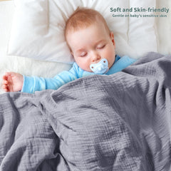 GUNTAIL swaddle baby wrapped in muslin demonstrates snug, secure swaddling and calm posture