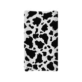 Guosanchn cow print diaper changing pad cover adds cozy protection during diaper changes.