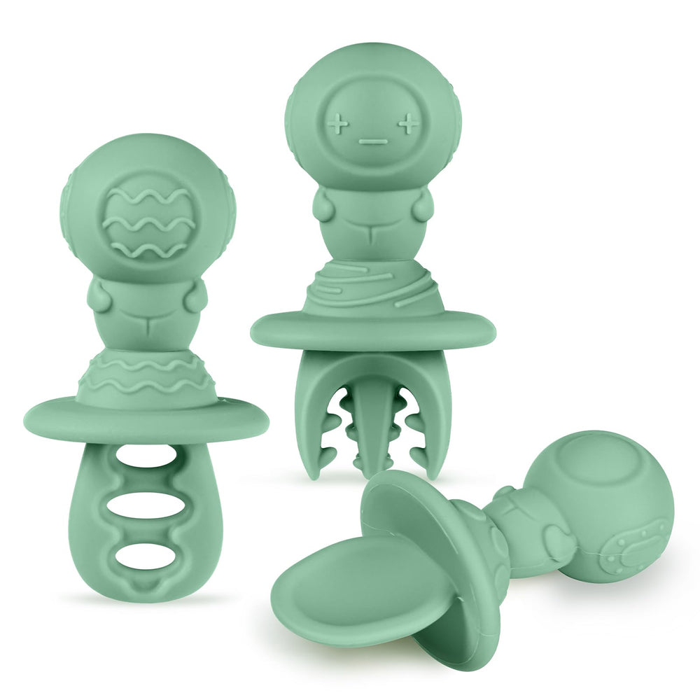 Haakaa silicone baby spoons with astronaut handle improve grip for self-feeding.