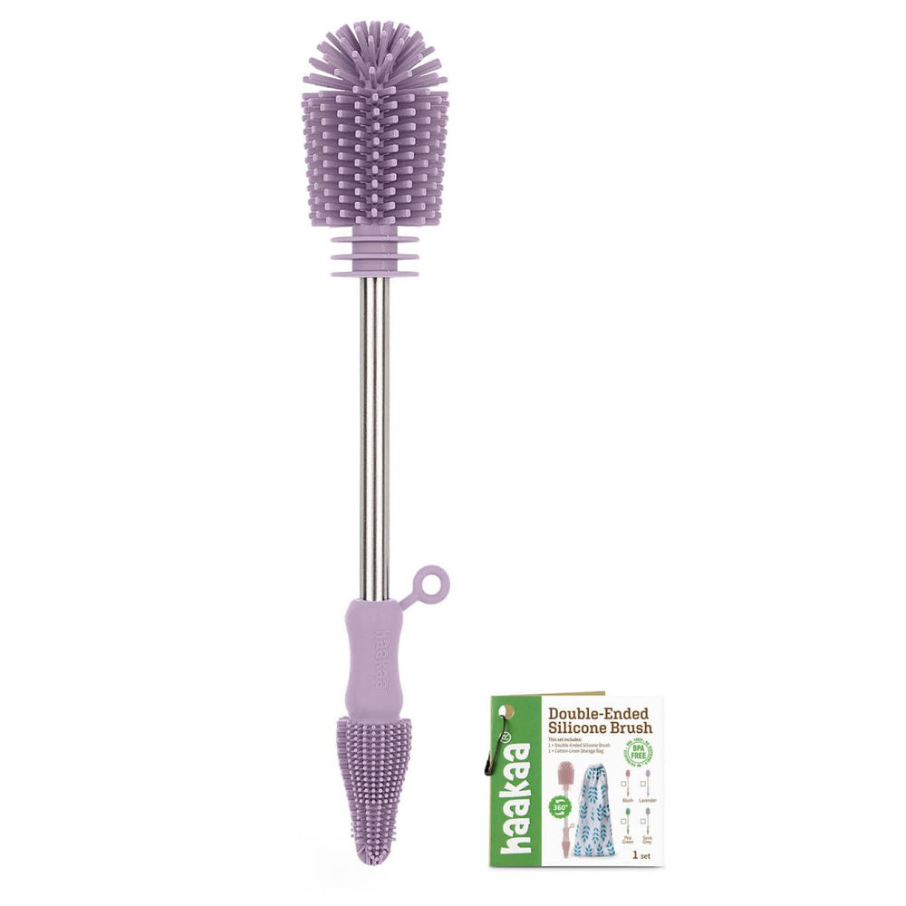 Haakaa double-ended brush with silicone bristles for bottles and pumps, deep-clean corners.