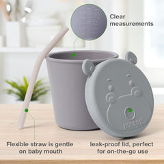 Haakaa Jolly Hippo leak-proof lid demonstrates spill-free on-the-go use.
