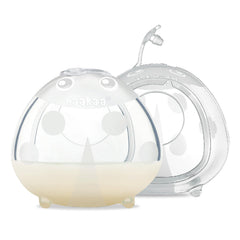 Haakaa Ladybug Milk Collector worn inside the bra for discreet let-down collection.