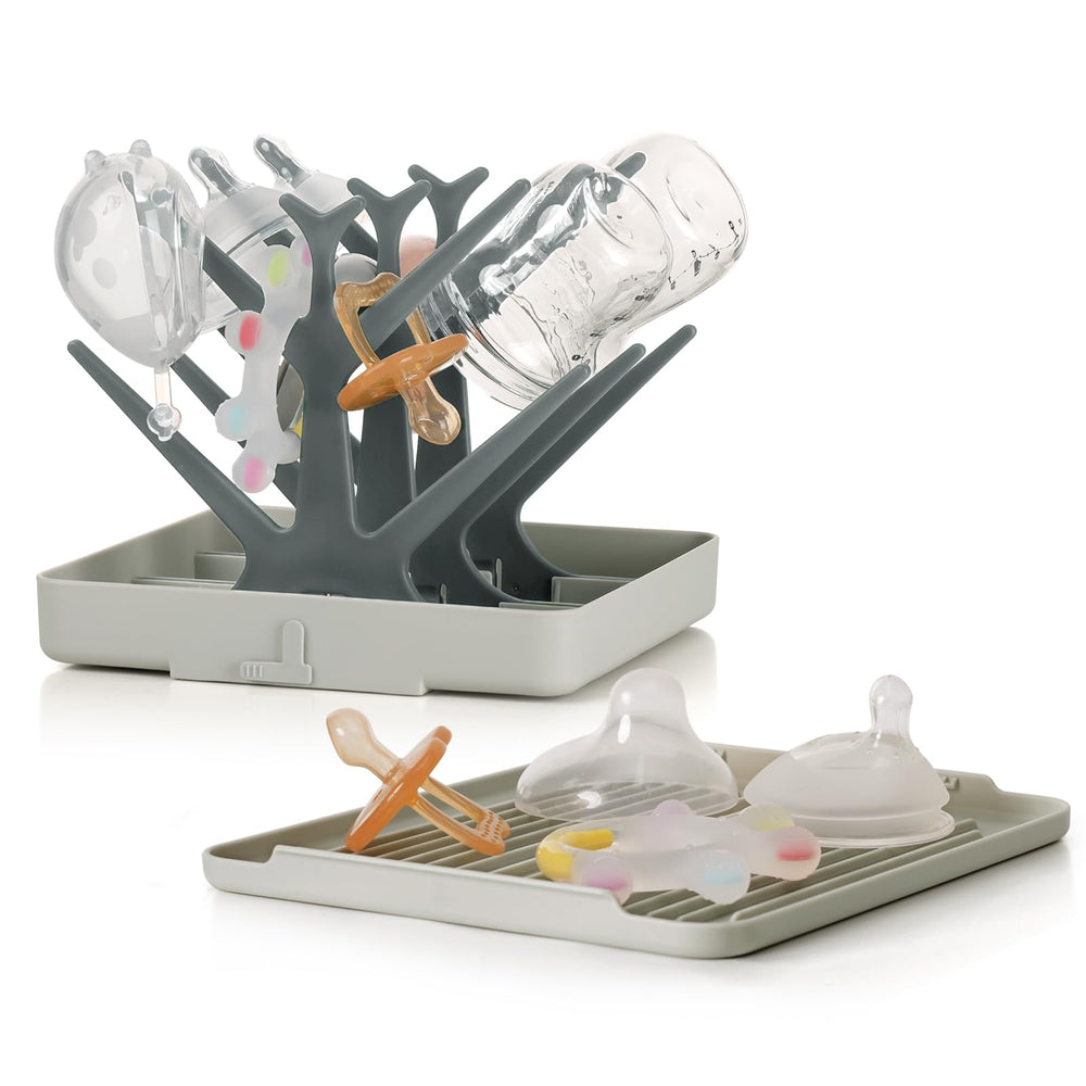 Haakaa portable bottle drying rack with tray keeps bottles organized and air-dried after washes.