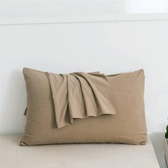 Hadi Bedding taupe pillowcase with zipper secures the pillow inside.