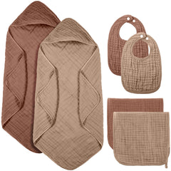 Hahafelt muslin hooded towel in dark brown keeps baby warm after bath.