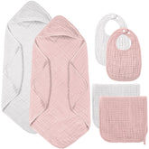 Hahafelt pink muslin hooded towel after bath keeps baby warm and dry.